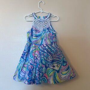 Lilly Pulitzer Sun dress with lace detail and pockets.